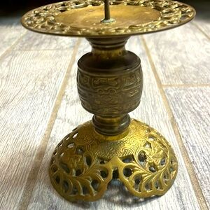 Ornate candlestick holder brass